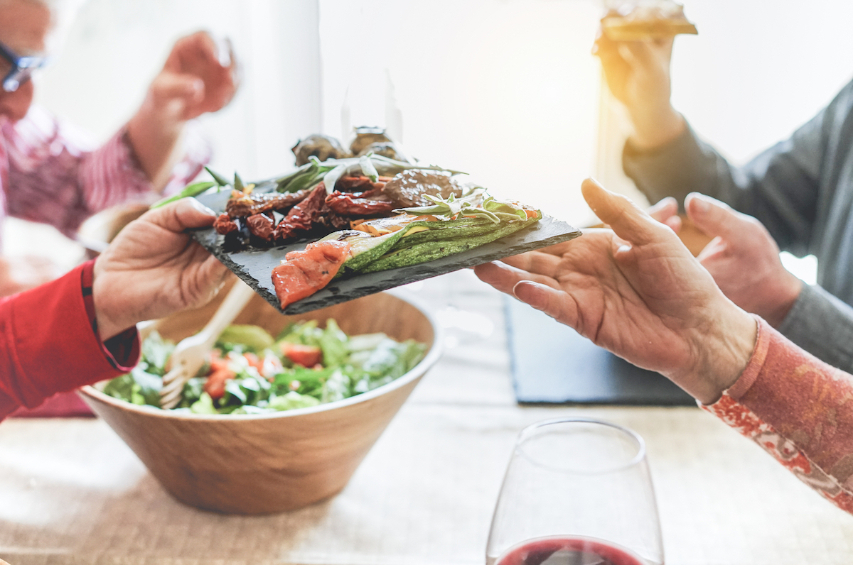 People passing food at a restaurant